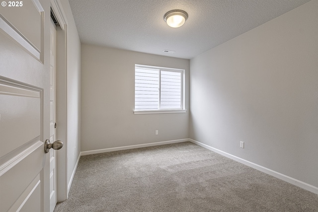 50 Shore Dr, Saint Helens, OR 97051 - unfurnished room featuring a textured ceiling, carpet floors, and baseboards