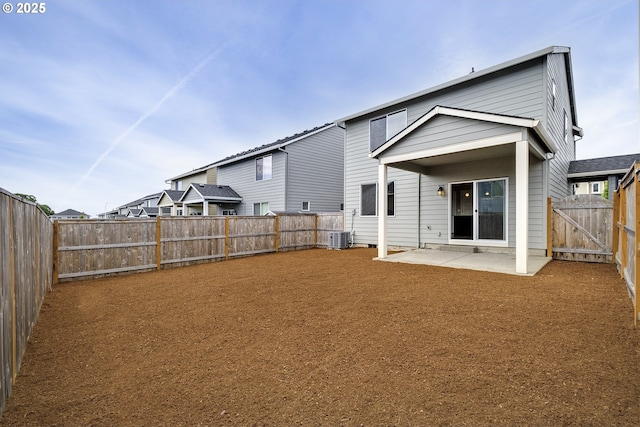 50 Shore Dr, Saint Helens, OR 97051 - rear view of property featuring a patio, a fenced backyard, cooling unit, and a gate