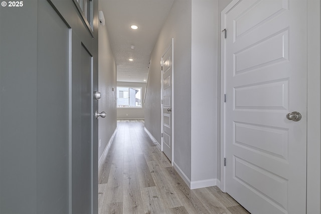 50 Shore Dr, Saint Helens, OR 97051 - corridor featuring light wood-type flooring, recessed lighting, and baseboards