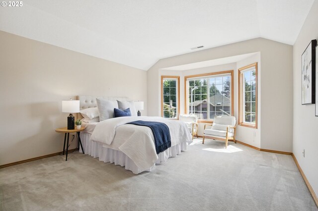 8355 SW 159th Pl, Beaverton, OR 97007 - bedroom with lofted ceiling, carpet, and baseboards