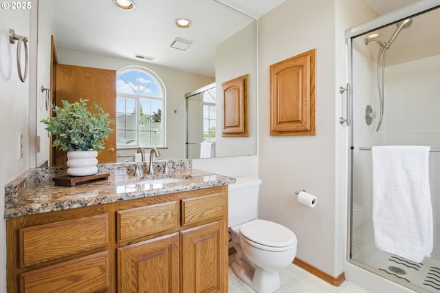 8355 SW 159th Pl, Beaverton, OR 97007 - full bath with toilet, a stall shower, vanity, recessed lighting, and baseboards