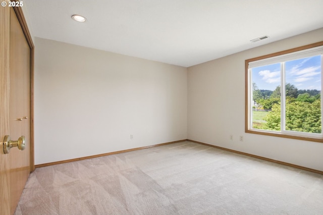 8355 SW 159th Pl, Beaverton, OR 97007 - empty room featuring light carpet, baseboards, and recessed lighting