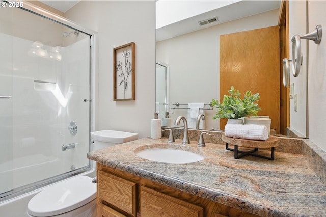 8355 SW 159th Pl, Beaverton, OR 97007 - full bathroom featuring toilet, vanity, and bath / shower combo with glass door
