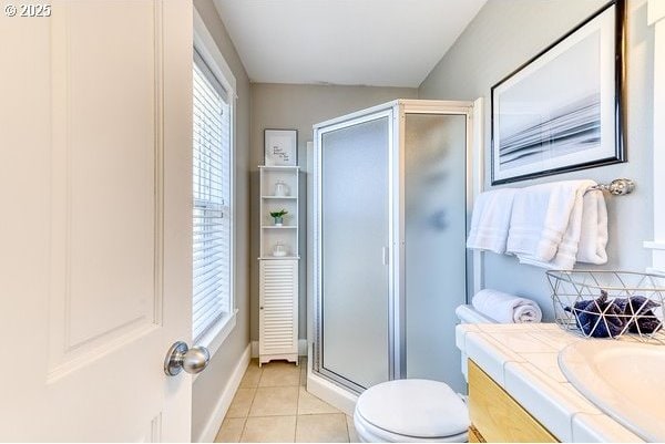 2752 SW Beach Ave, Lincoln City, OR 97367 - bathroom featuring vanity, toilet, tile patterned flooring, and a shower stall