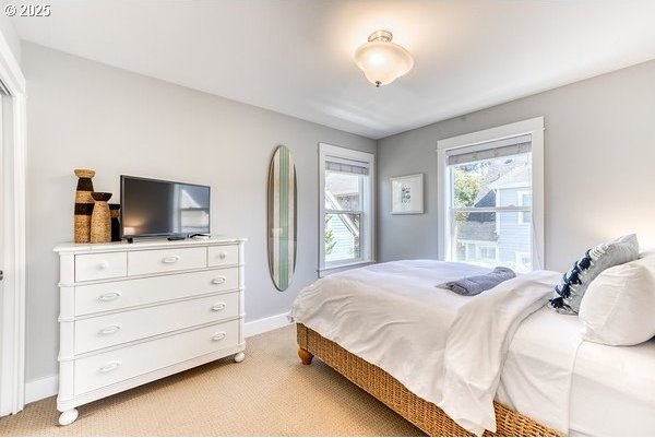 2752 SW Beach Ave, Lincoln City, OR 97367 - bedroom featuring light colored carpet and baseboards