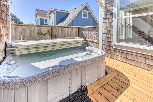 2752 SW Beach Ave, Lincoln City, OR 97367 - exterior space featuring a hot tub, fence, and a wooden deck