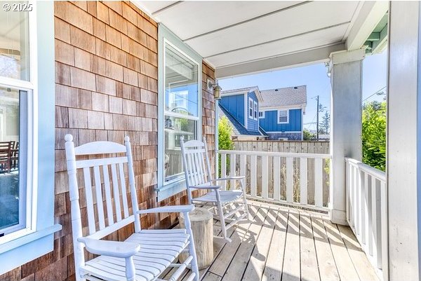 2752 SW Beach Ave, Lincoln City, OR 97367 - balcony featuring a porch