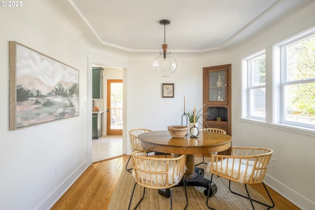 5835 NE 23rd Ave, Portland, OR 97211 - dining space featuring healthy amount of natural light and light wood-style floors