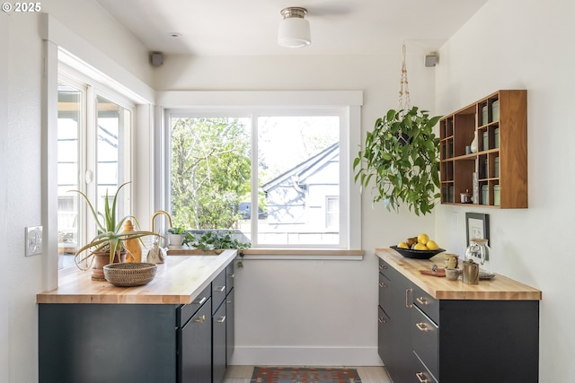 5835 NE 23rd Ave, Portland, OR 97211 - kitchen with butcher block countertops and healthy amount of natural light