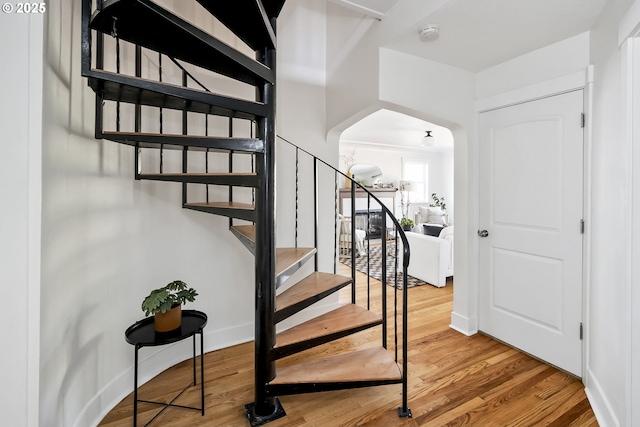 5835 NE 23rd Ave, Portland, OR 97211 - staircase featuring arched walkways and wood finished floors
