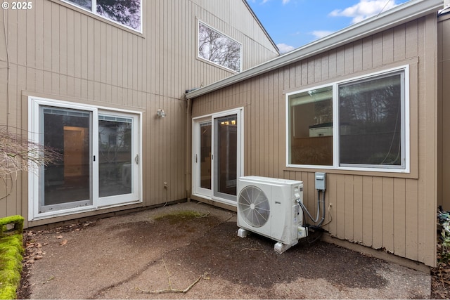 view of patio / terrace featuring ac unit