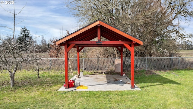 view of yard featuring a gazebo, a fenced backyard, and a patio area