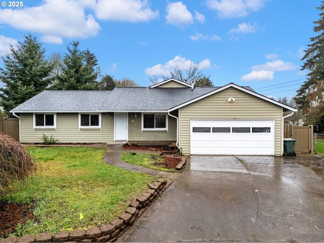 ranch-style house with a front yard and a garage