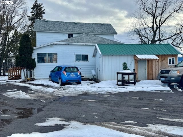 view of snow covered property