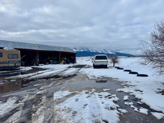 exterior space featuring a mountain view