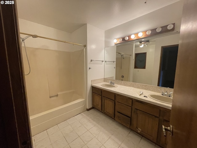 bathroom with shower / bathtub combination and vanity