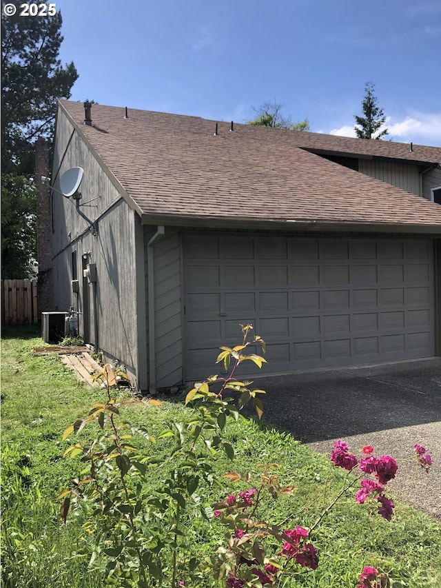 garage featuring central AC unit