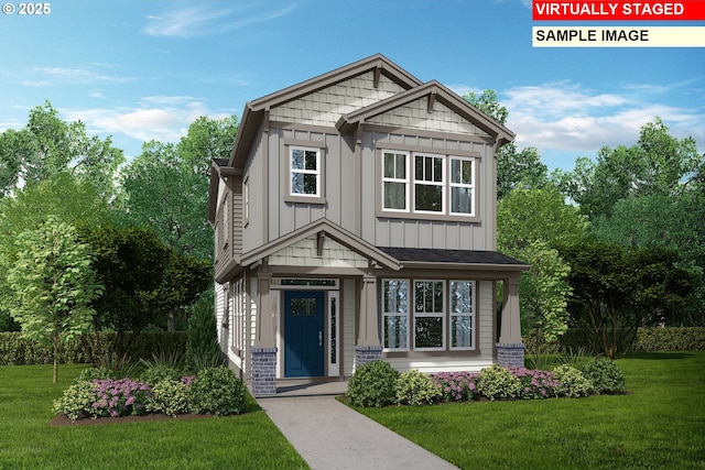 craftsman house with board and batten siding and a front yard