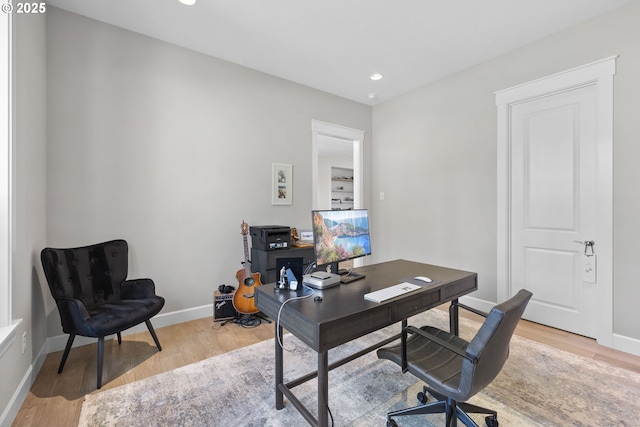 office area with baseboards, recessed lighting, and light wood-style flooring