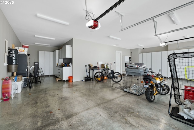 garage featuring a garage door opener