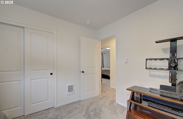 14008 SE Center St Unit A, Portland, OR 97236 - bedroom featuring light carpet and a closet