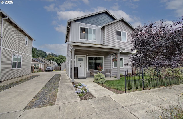 14008 SE Center St Unit A, Portland, OR 97236 - view of front facade featuring board and batten siding and a porch