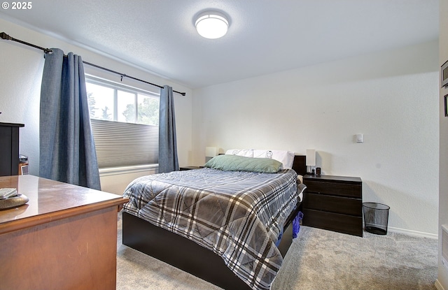 14008 SE Center St Unit A, Portland, OR 97236 - bedroom featuring light colored carpet and baseboards