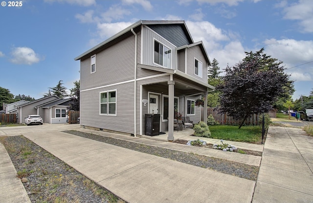 14008 SE Center St Unit A, Portland, OR 97236 - view of front of home with concrete driveway and covered porch