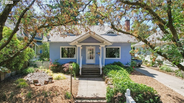 3914 SE Ivon St, Portland, OR 97202 - bungalow-style house with a chimney and roof with shingles