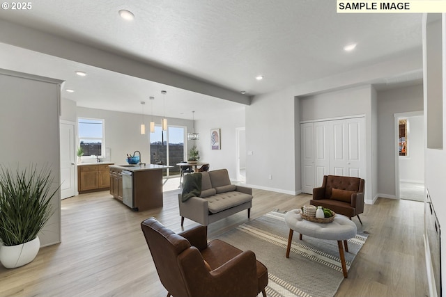 1197 NE Emerald Dr, Hermiston, OR 97838 - living area featuring light wood-type flooring and recessed lighting