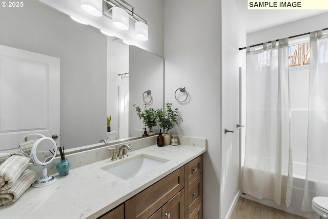 1197 NE Emerald Dr, Hermiston, OR 97838 - full bath featuring vanity, shower / bathtub combination with curtain, and wood finished floors