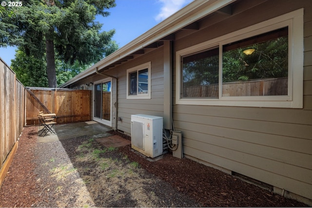 9334 N Lombard St Unit 7, Portland, OR 97203 - view of side of property featuring a fenced backyard and a patio area