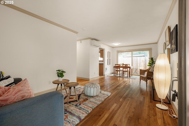 9334 N Lombard St Unit 7, Portland, OR 97203 - living room with a wall mounted air conditioner, ornamental molding, and wood finished floors