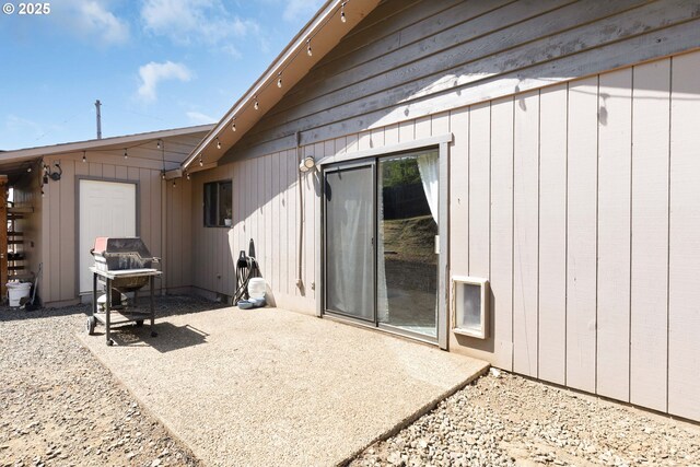 rear view of house featuring a patio