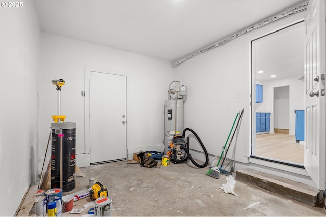 garage with strapped water heater