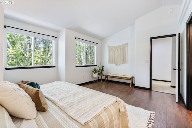 14426 SE Princeton Village Way, Clackamas, OR 97015 - bedroom with lofted ceiling, dark wood-style floors, and baseboards