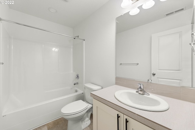 bathroom with toilet, visible vents, shower / bathing tub combination, and vanity