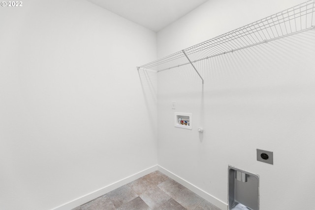 washroom with laundry area, hookup for a washing machine, baseboards, hookup for a gas dryer, and electric dryer hookup