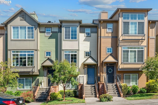 17047 SW Berkeley Ln, Beaverton, OR 97003 - multi unit property featuring a chimney