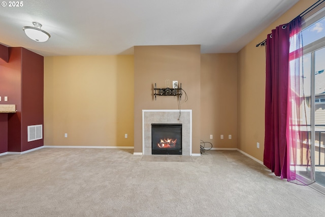 17047 SW Berkeley Ln, Beaverton, OR 97003 - unfurnished living room with a fireplace, carpet flooring, and baseboards