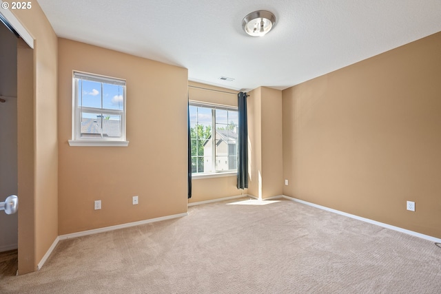 17047 SW Berkeley Ln, Beaverton, OR 97003 - carpeted empty room featuring baseboards