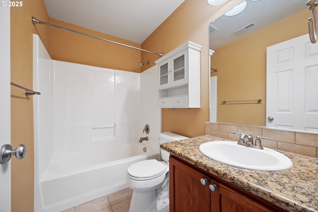 17047 SW Berkeley Ln, Beaverton, OR 97003 - full bath featuring toilet, tile patterned floors, vanity, shower / tub combination, and decorative backsplash