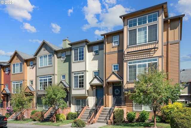 17047 SW Berkeley Ln, Beaverton, OR 97003 - townhome / multi-family property featuring a residential view and board and batten siding