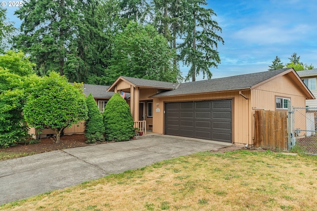 5715 SW 191st Ave, Beaverton, OR 97078 - ranch-style home featuring a garage, driveway, and a shingled roof
