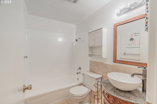 5715 SW 191st Ave, Beaverton, OR 97078 - bathroom featuring tile walls, vanity, shower / washtub combination, and a wainscoted wall