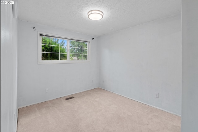 5715 SW 191st Ave, Beaverton, OR 97078 - empty room with a textured ceiling and carpet floors