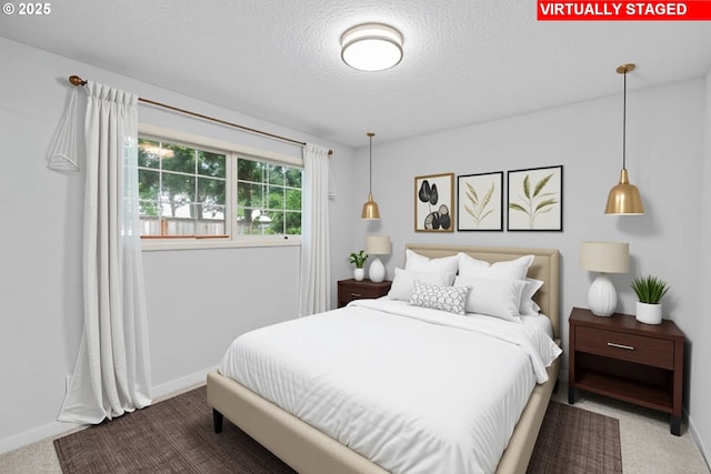 5715 SW 191st Ave, Beaverton, OR 97078 - bedroom featuring a textured ceiling and carpet flooring