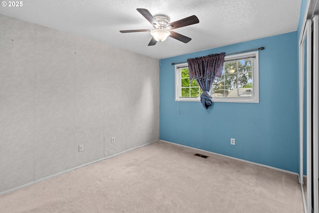 5715 SW 191st Ave, Beaverton, OR 97078 - carpeted spare room featuring a ceiling fan and a textured ceiling