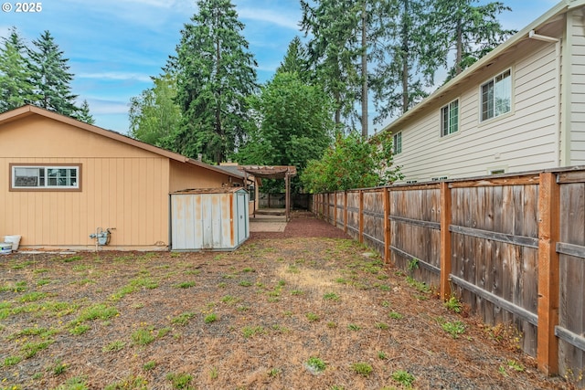5715 SW 191st Ave, Beaverton, OR 97078 - fenced backyard featuring a storage unit