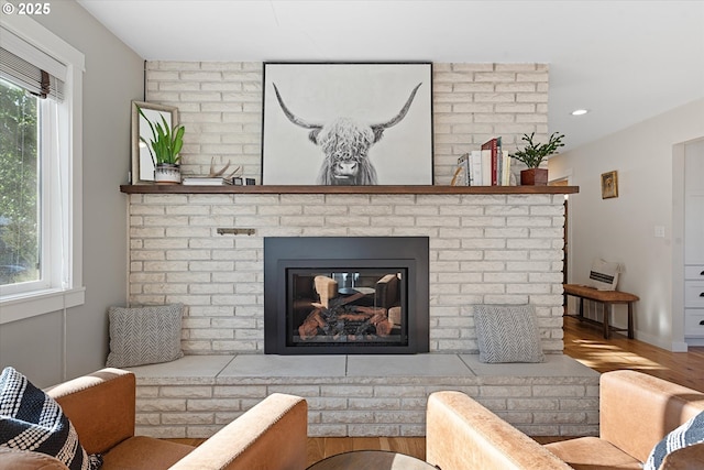 99 Walnut St, La Grande, OR 97850 - living room with a fireplace, wood finished floors, and recessed lighting